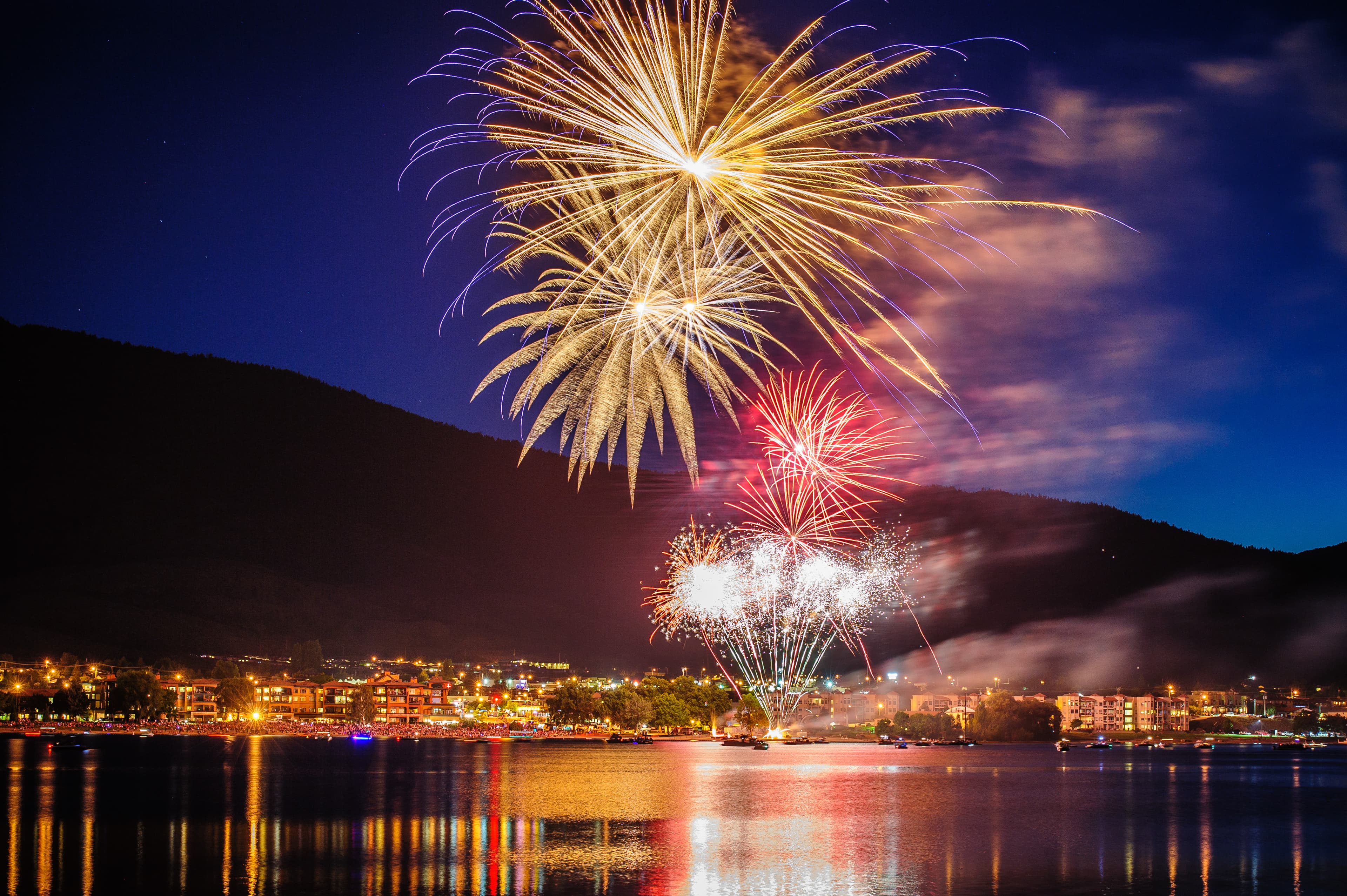 Fireworks burst over Osoyoos Lake to end the evening at Cherry Fiesta