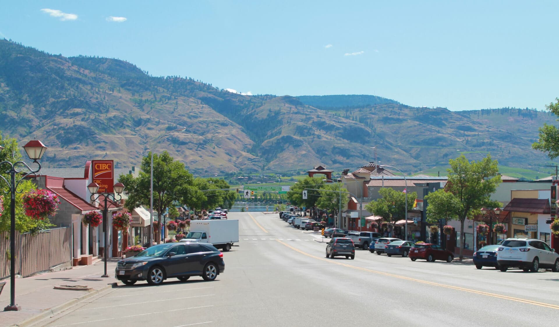 Downtown Osoyoos Main Street in summer with the South Okanagan hills beyond